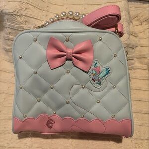 New with tags Cinderella lounge fly purse.
